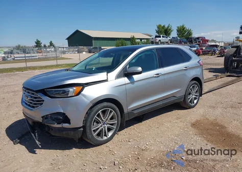 2022 Ford Edge Titanium z USA, uszkodzony, nr VIN 2FMPK4K91NBA97190